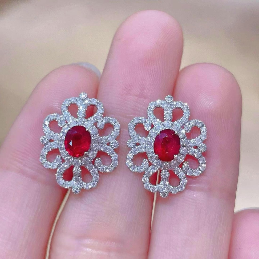 14k Gold 1.82 Ctw Natural Ruby & Diamond Earrings: Ref:230944294 // gold content:14k gold // main gemstone:ruby // shape:oval // carat weight:1. 00ct // color:red // treatment:natural // // adjacent gemstone 2 : diamond // shape:round // carat weight: