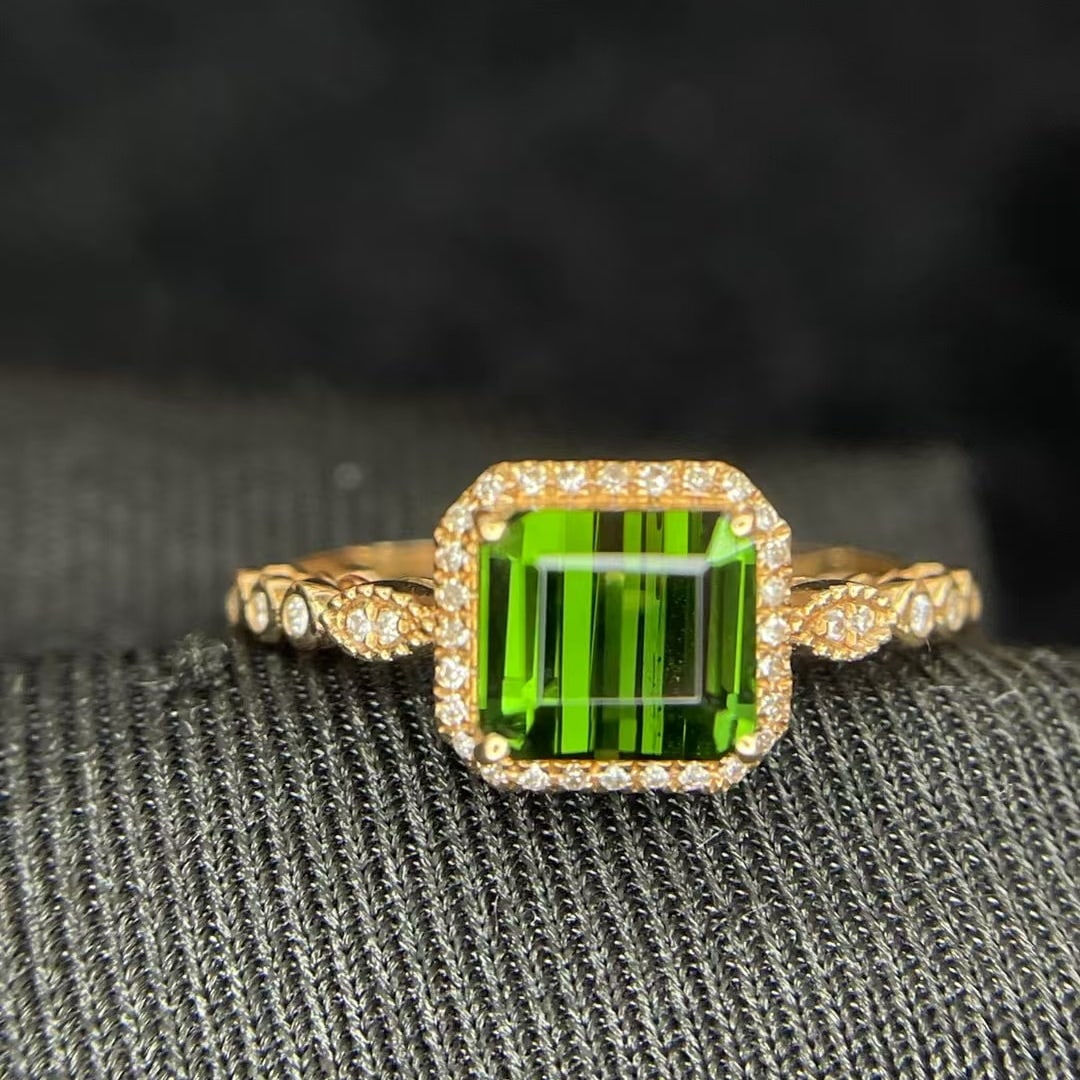 14k Gold 1.55 Ct Natural Tourmaline & Diamond Ring: Ref:230944340 // gold content:14k gold // ring size:7. 25us // // main gemstone:tourmaline // shape:octagonal // carat weight:1. 55ct // color:green // treatment:natural // // adjacent gemstone 2 : di