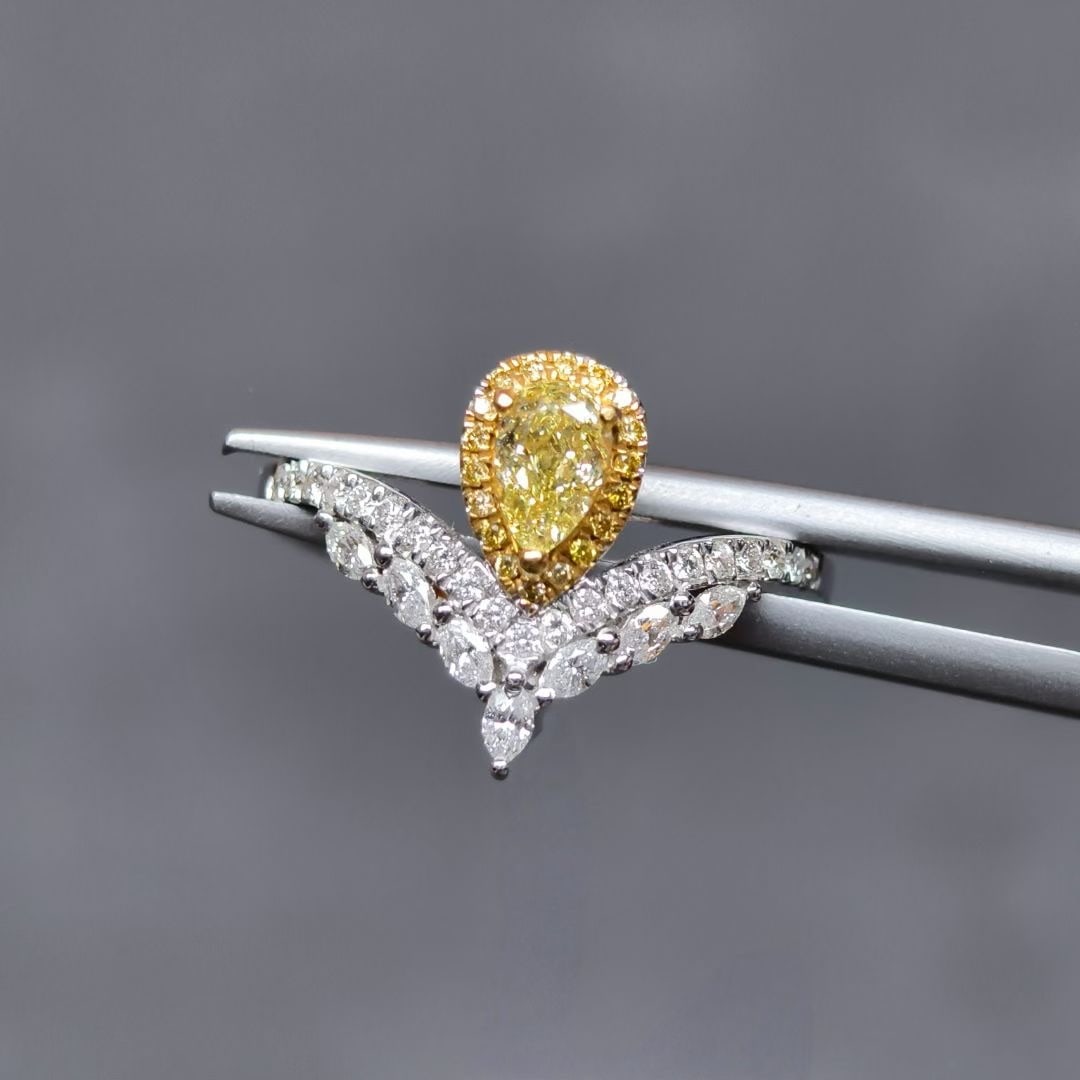14k Gold 0.71 Ctw Natural Yellow Diamond & Diamond Ring: Ref:230944364 // gold content:14k gold // ring size:7. 25us // // main gemstone:yellow diamond // shape:pear // carat weight:0. 34ct // color:yellow // treatment:natural // // adjacent gemstone 2