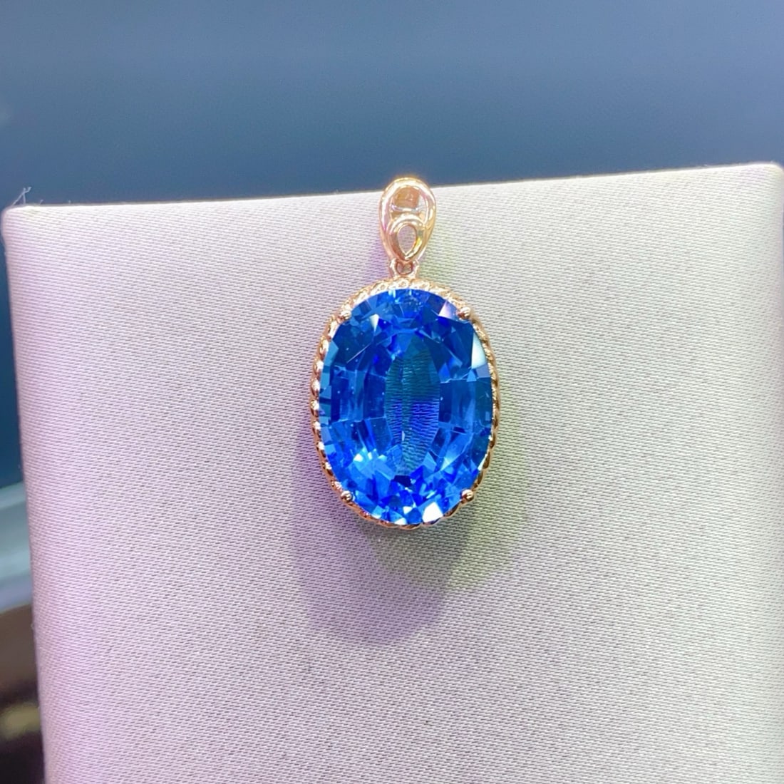 14k Gold 14.8 Ct Natural Topaz Pendant( Without Chain ): Ref:230944379 // gold content:14k gold // main gemstone:topaz // shape:oval // carat weight:14. 8ct // color:blue // treatment:natural // High Estimate: 4300 Condition: New Low Estimate: 2900