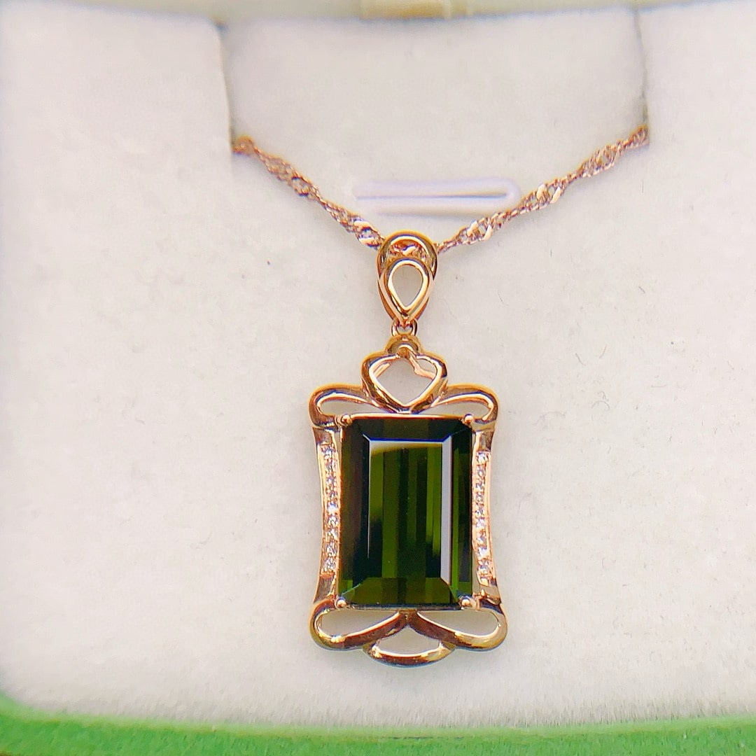 14k Gold 5.45 Ctw Natural Tourmaline & Diamond Pendant( Without Chain ): Ref:230944391 // gold content:14k gold // main gemstone:tourmaline // shape:octagonal // carat weight:5. 4ct // color:green // treatment:natural // // adjacent gemstone 2 : diamond // number of