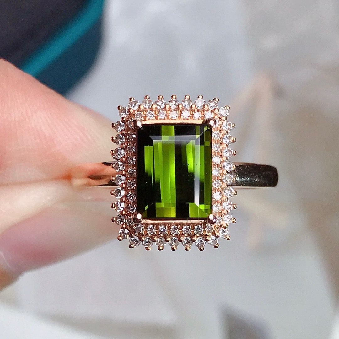 14k Gold 1.7 Ct Natural Tourmaline & Diamond Ring: Ref:230944409 // gold content:14k gold // ring size:7. 25us // // main gemstone:tourmaline // shape:rectangle // carat weight:1. 7ct // color:green // treatment:natural // // adjacent gemstone 2 :