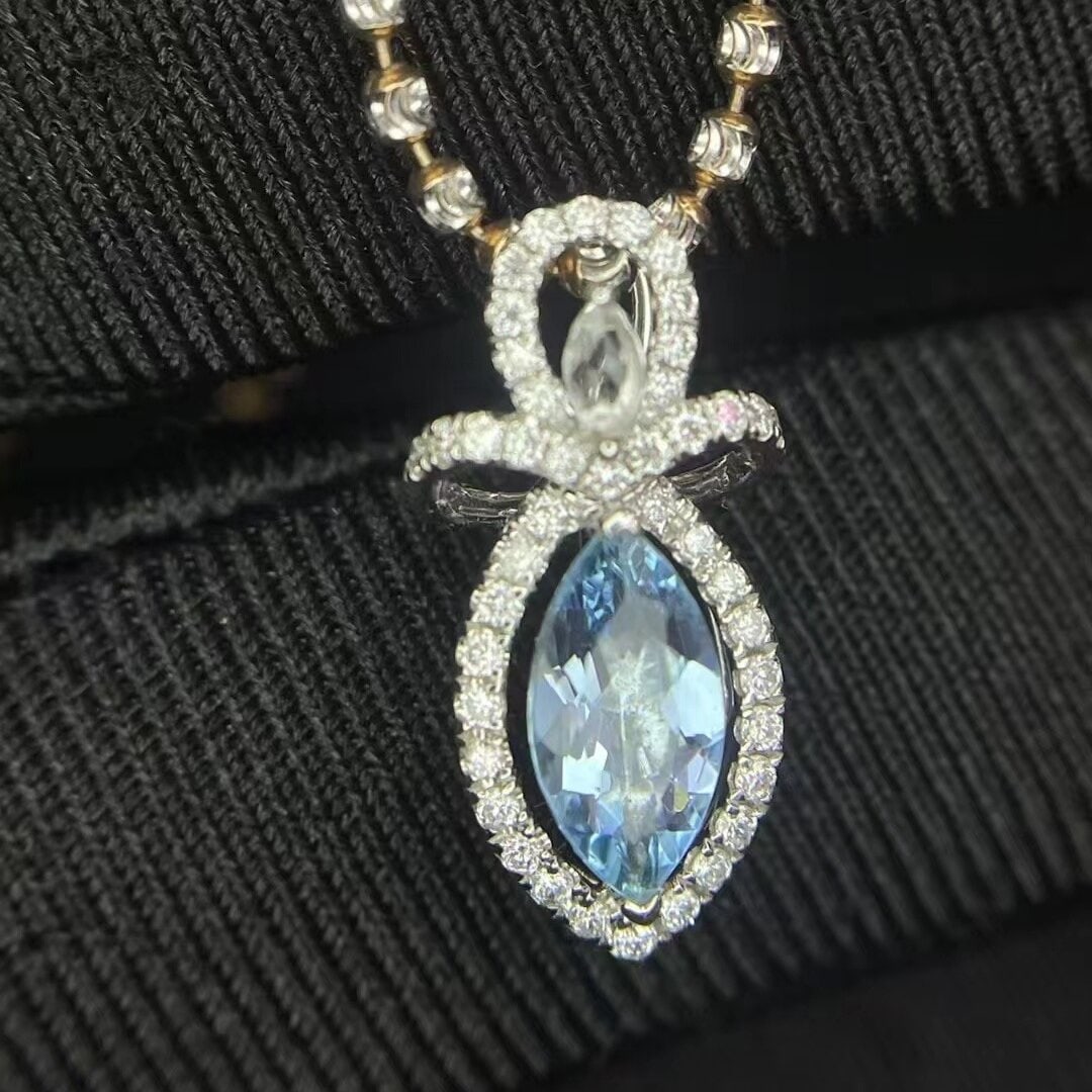14k Gold 0.50 Ct Natural Aquamarine & Diamond Pendant( Without Chain ): Ref:230944436 // gold content:14k gold // main gemstone:aquamarine // shape:marquise // carat weight:0. 50ct // color:santa maria color // treatment:natural // // adjacent gemstone 2 : diamond //