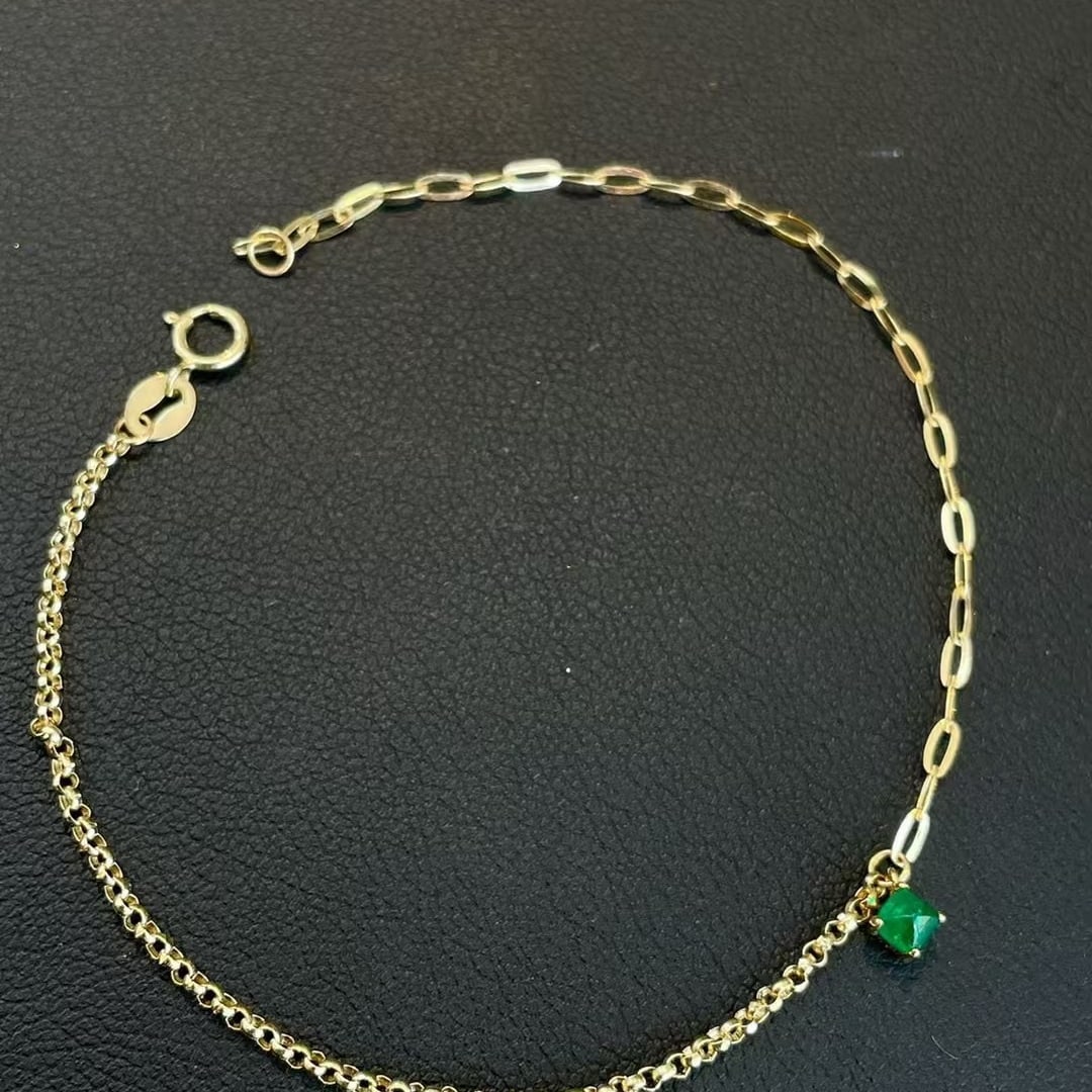 14k Gold 0.2 Ct Natural Emerald Bracelet: Ref:230945011 // gold content:14k gold // main gemstone:emerald // shape:suger-loaf // carat weight:0. 2ct // color:green // treatment:natural // High Estimate: 2000Low Estimate: 1300Condition: New