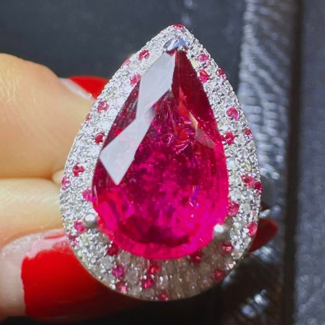 14k Gold 2.39 Ct Natural Tourmaline & Diamond Ring: Ref:230945020 // gold content:14k gold // ring size:7. 25us // // main gemstone:tourmaline // shape:pear // carat weight:2. 39ct // color:red // treatment:natural // // adjacent gemstone 2 :