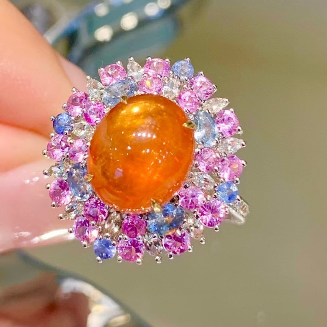 14k Gold 5.1 Ct Natural Spessartine & Diamond & Sapphire Ring: Ref:230945041 // gold content:14k gold // ring size:7. 25us // // main gemstone:spessartine // shape:oval // carat weight:5. 1ct // color:orange // treatment:natural // // adjacent gemstone 2 : diamon