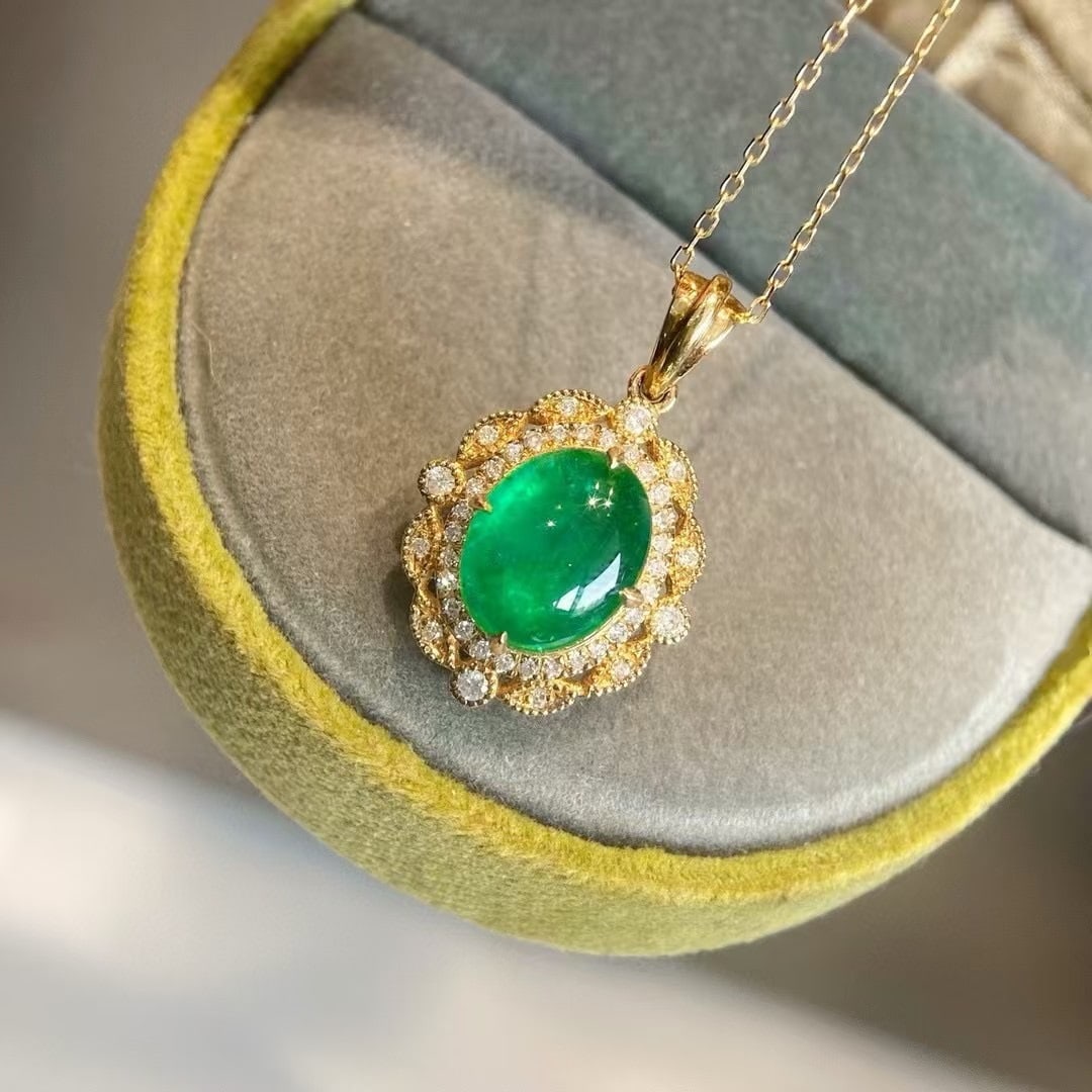 14k Gold 2.49 Ctw Natural Emerald & Diamond Pendant( Without Chain ): Ref:230945097 // gold content:14k gold // main gemstone:emerald // shape:oval // carat weight:2. 27ct // color:green // treatment:natural // // adjacent gemstone 2 : diamond // shape:round // carat