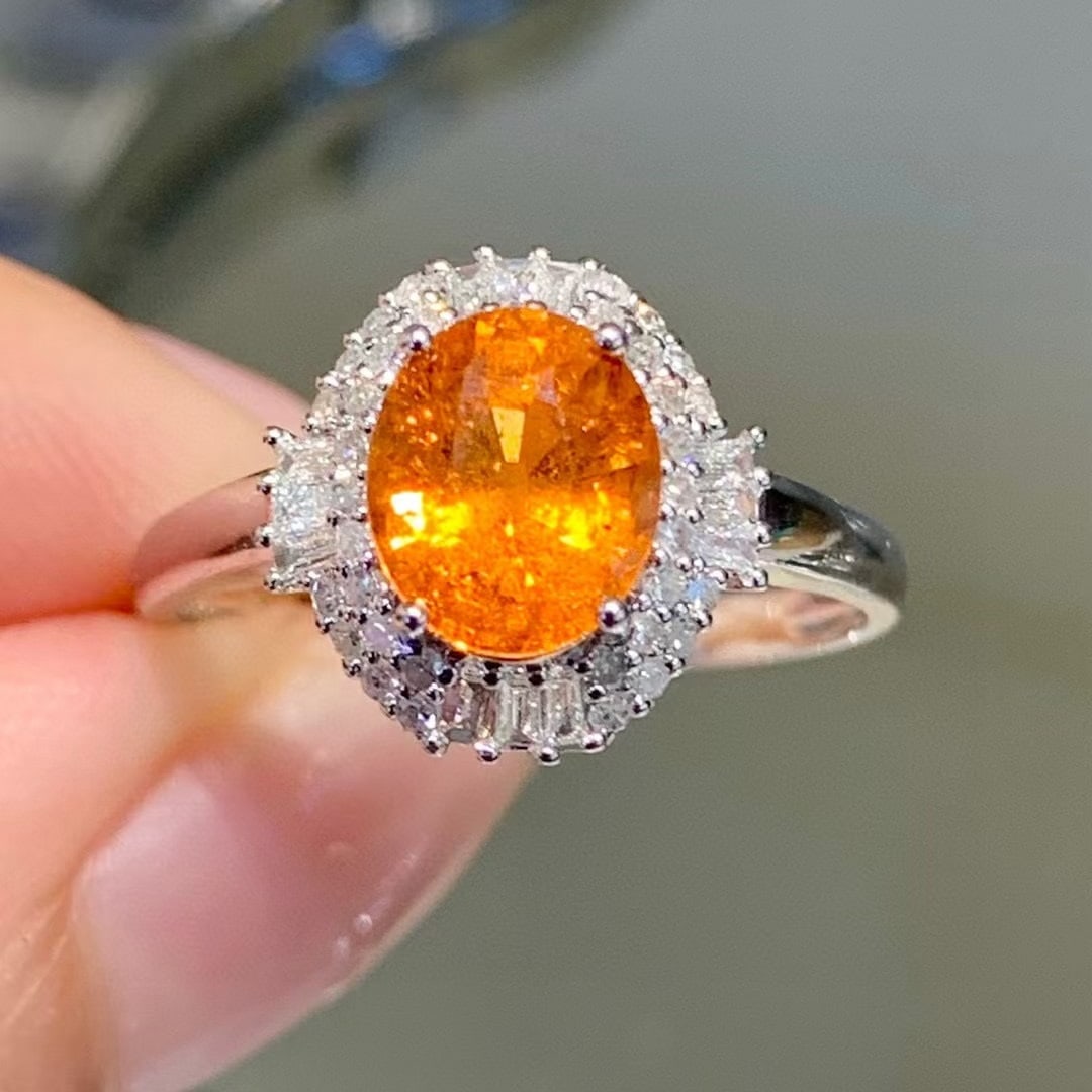 14k Gold 1.8 Ct Natural Spessartine & Diamond Ring: Ref:230945132 // gold content:14k gold // ring size:7. 25us // // main gemstone:spessartine // shape:oval // carat weight:1. 8ct // color:orange // treatment:natural // // adjacent gemstone 2 :