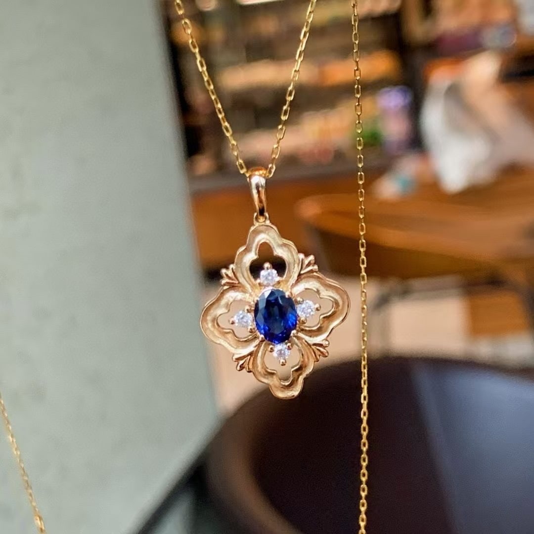 14k Gold 0.65 Ctw Natural Sapphire & Diamond Pendant( Without Chain ): Ref:230945140 // gold content:14k gold // main gemstone:sapphire // shape:oval // carat weight:0. 55ct // color:blue // treatment:natural // // adjacent gemstone 2 : diamond // shape:round // carat