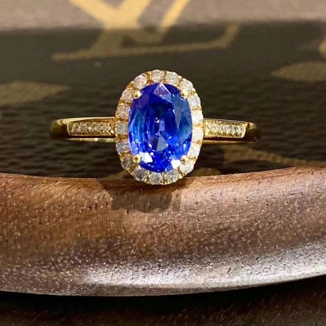 14k Gold 1.5 Ct Vivid Blue Natural Sapphire & Diamond Ring: Ref:230945190 // gold content:14k gold // ring size:7. 25us // // main gemstone:sapphire // shape:oval // carat weight:1. 5ct // color:vivid blue // treatment:natural // // adjacent gemstone 2 : diamo