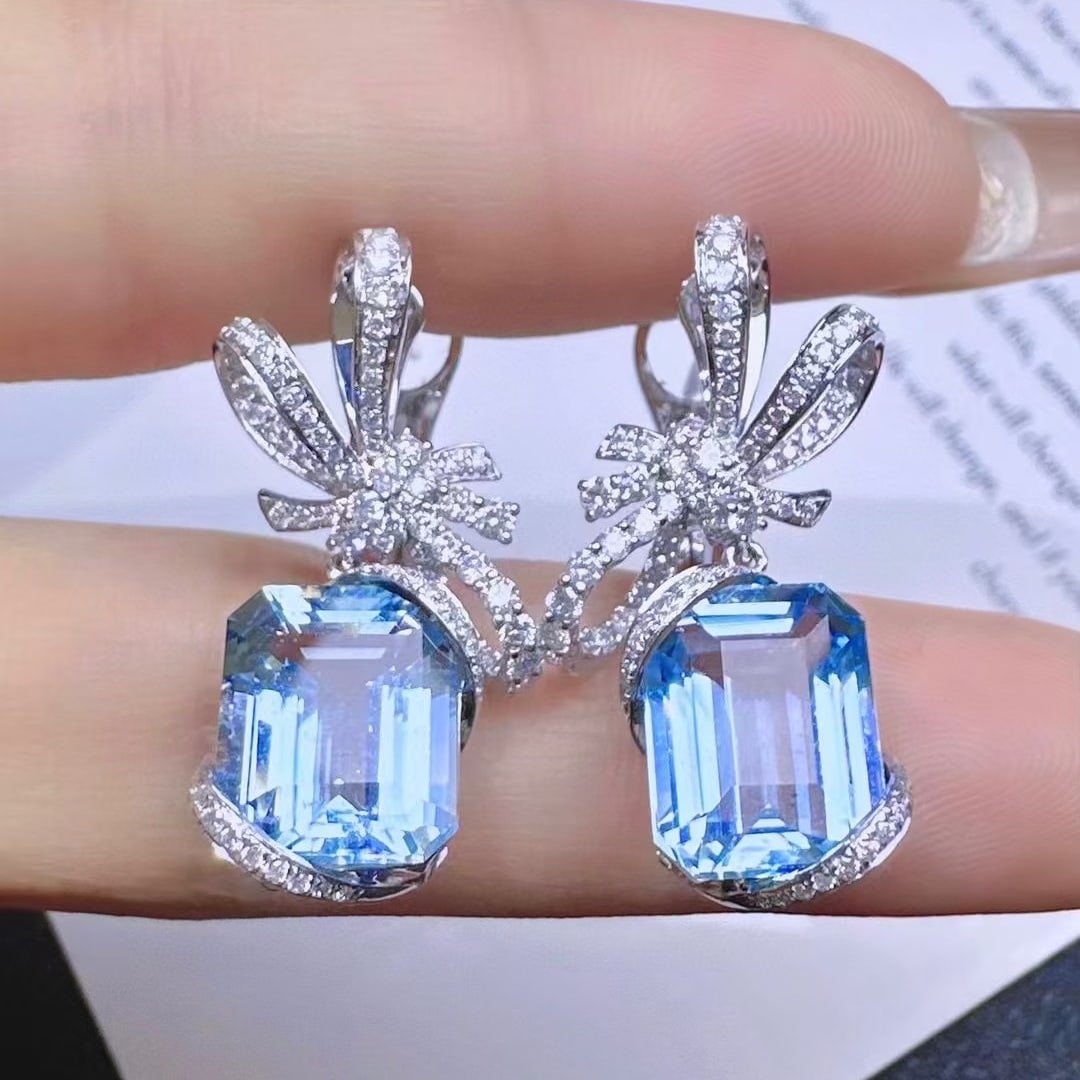 14k Gold 10.48 Ctw Natural Aquamarine & Diamond Earrings: Ref:230945229 // gold content:14k gold // main gemstone:aquamarine // shape:octagonal // carat weight:9. 57ct // color:santa maria color // treatment:natural // // adjacent gemstone 2 : diamond // sha