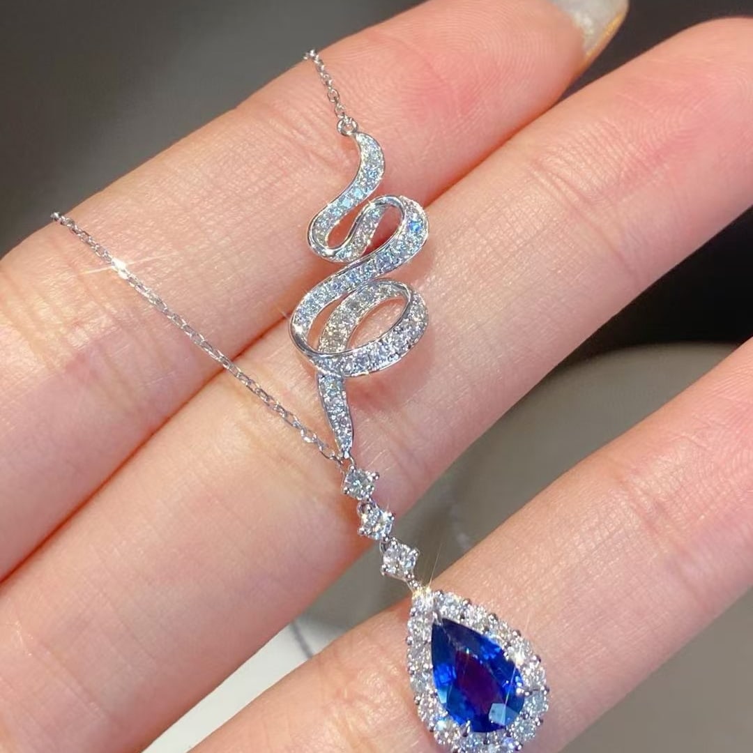 14k Gold 1.89 Ctw Natural Sapphire & Diamond Necklace: Ref:230945242 // gold content:14k gold // main gemstone:sapphire // shape:pear // carat weight:1. 15ct // color:royal blue // treatment:natural // // adjacent gemstone 2 : diamond // shape:round //