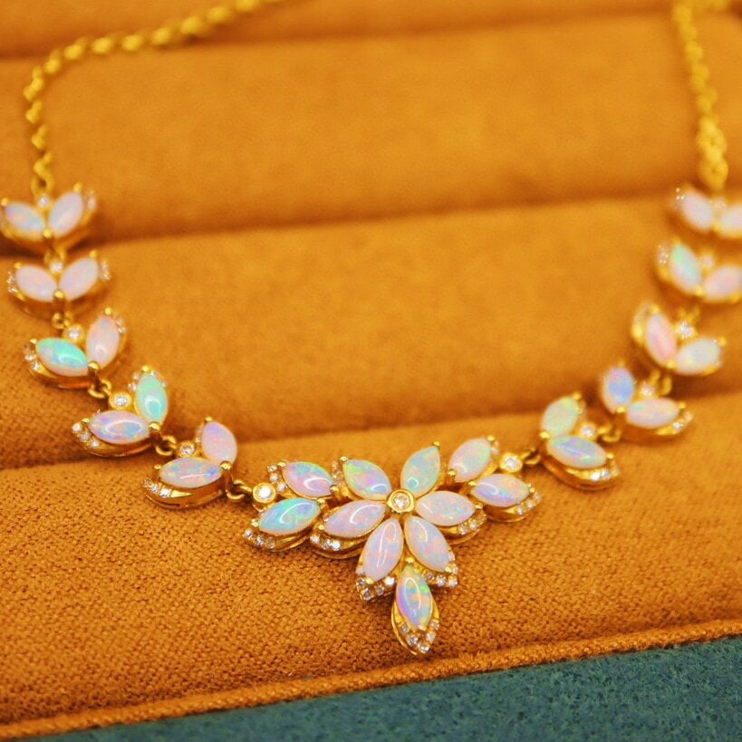 14k Gold 3.38 Ctw Natural Opal & Diamond Necklace: Ref:230946033 // gold content:14k gold // main gemstone:opal // shape:marquise // carat weight:2. 79ct // color:white // treatment:natural // // adjacent gemstone 2 : diamond // number of
