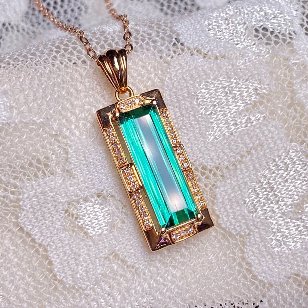 14k Gold 2.35 Ct Natural Tourmaline & Diamond Pendant( Without Chain ): Ref:230946040 // gold content:14k gold // main gemstone:tourmaline // shape:rectangle // carat weight:2. 35ct // color:green // treatment:natural // // adjacent gemstone 2 : diamond // number of