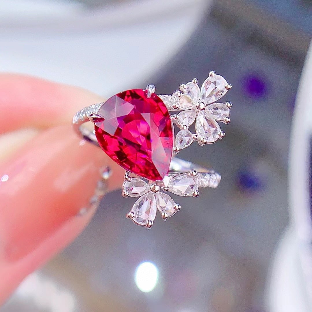 14k Gold 3.95 Ctw Natural Tourmaline & Diamond Ring: Ref:230946048 // gold content:14k gold // ring size:7. 25us // // main gemstone:tourmaline // shape:pear // carat weight:3. 5ct // color:red // treatment:natural // // adjacent gemstone 2 : diamond //