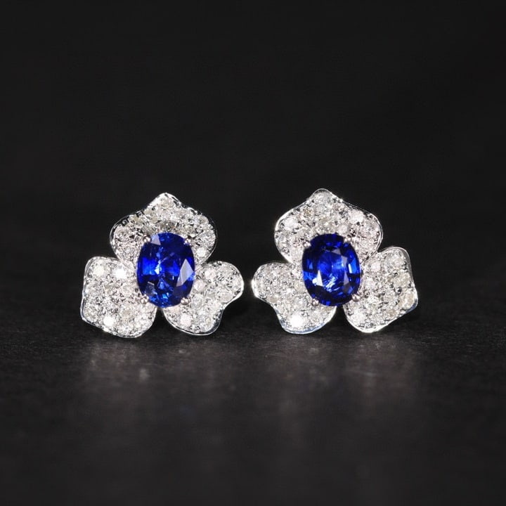 14k Gold 1.23 Ctw Vivid Blue Natural Sapphire & Diamond Earrings: Ref:230946082 // gold content:14k gold // main gemstone:sapphire // shape:oval // carat weight:0. 78ct // color:vivid blue // treatment:natural // // adjacent gemstone 2 : diamond // shape:round //