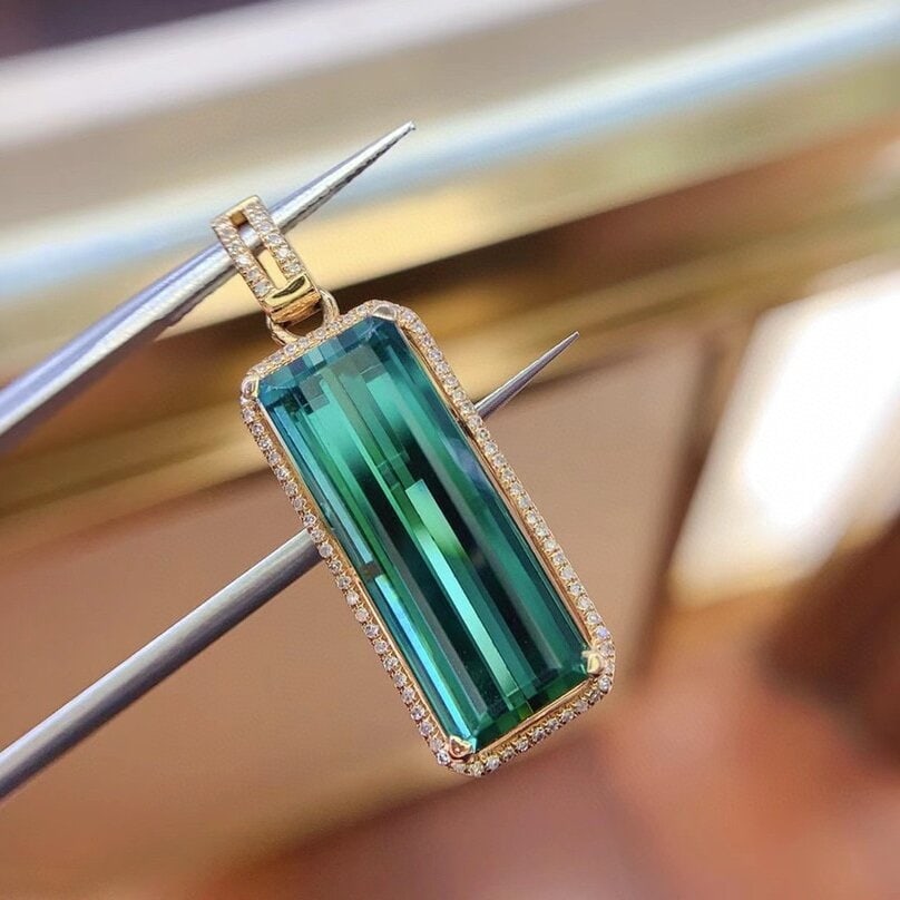 14k Gold 11.16 Ct Natural Tourmaline & Diamond Pendant( Without Chain ): Ref:230946133 // gold content:14k gold // main gemstone:tourmaline // shape:octagonal // carat weight:11. 16ct // color:green // treatment:natural // // adjacent gemstone 2 : diamond // shape:round