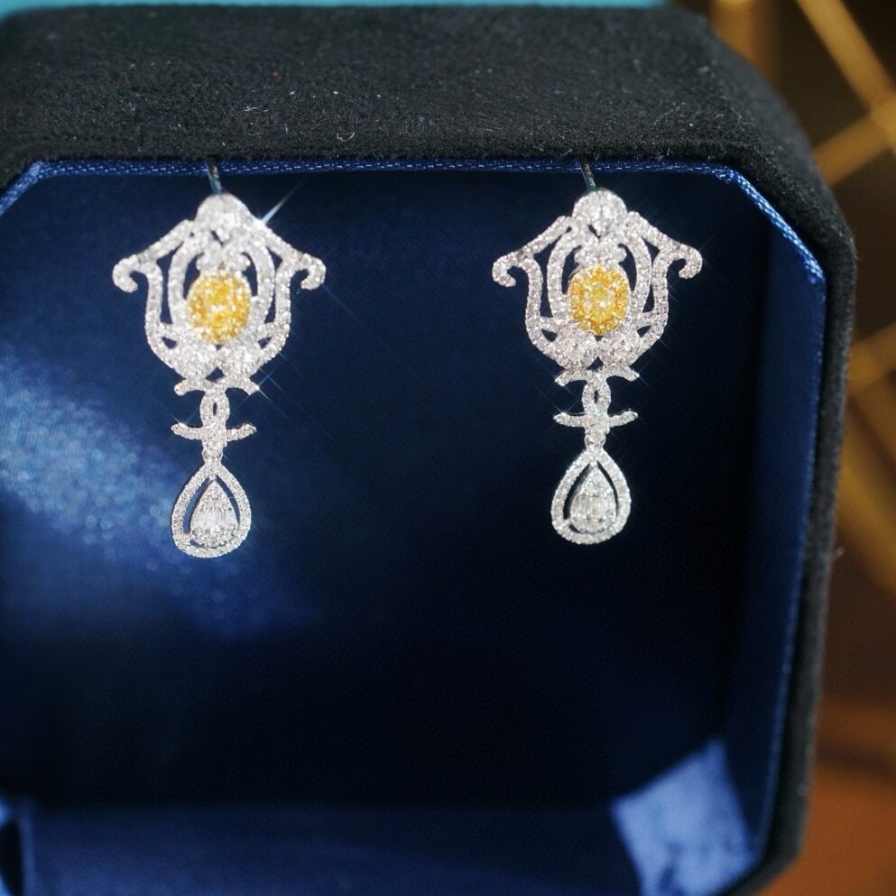 14k Gold 1.30 Ctw Natural Yellow Diamond & Diamond Earrings: Ref:230946148 // gold content:14k gold // main gemstone:yellow diamond // shape:oval // carat weight:0. 26ct // color:yellow // treatment:natural // // adjacent gemstone 2 : diamond // shape:multiply