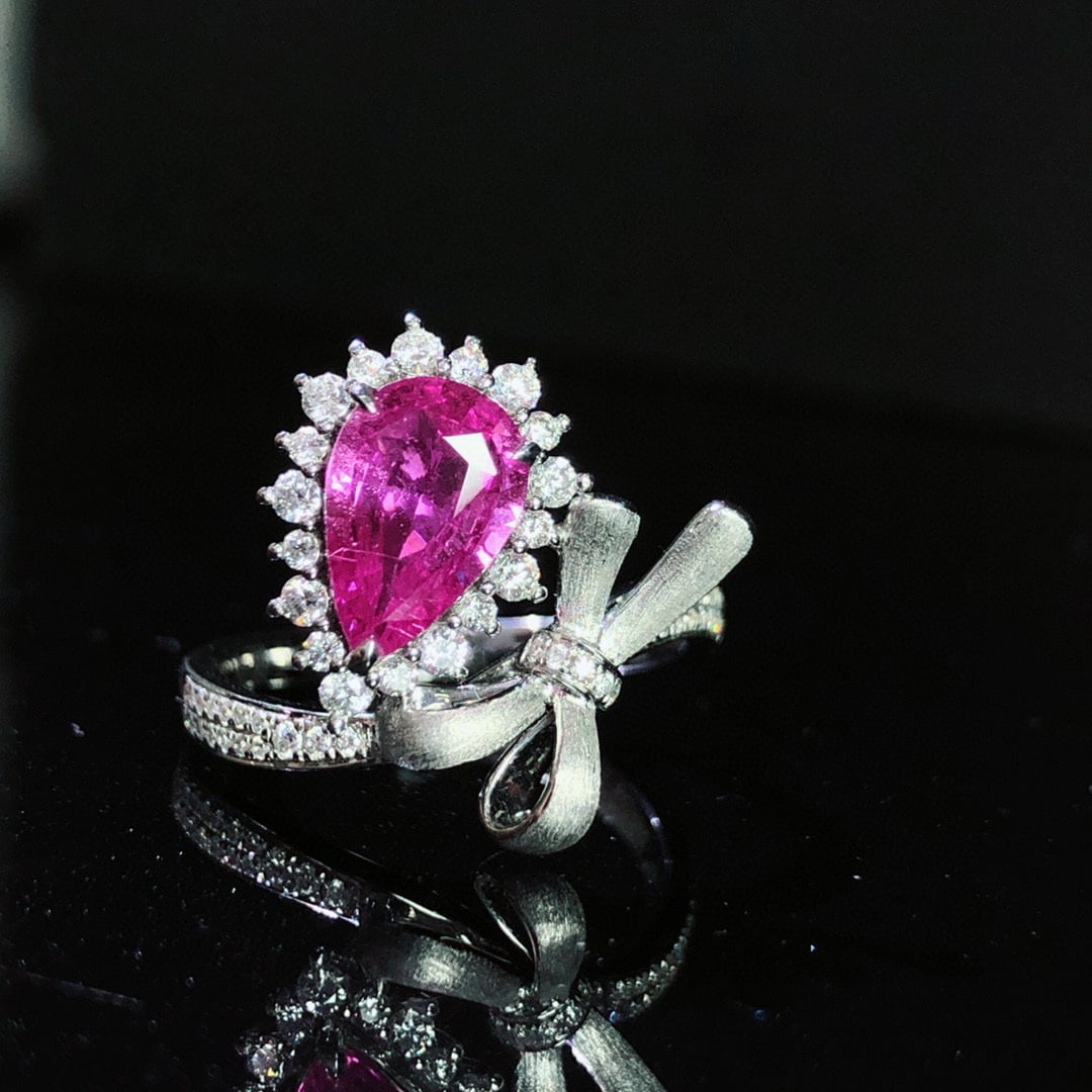 14k Gold 1.94 Ctw Natural Sapphire & Diamond Ring: Ref:230946198 // gold content:14k gold // ring size:7. 25us // // main gemstone:sapphire // shape:pear // carat weight:1. 54ct // color:pink // treatment:natural // // adjacent gemstone 2 :