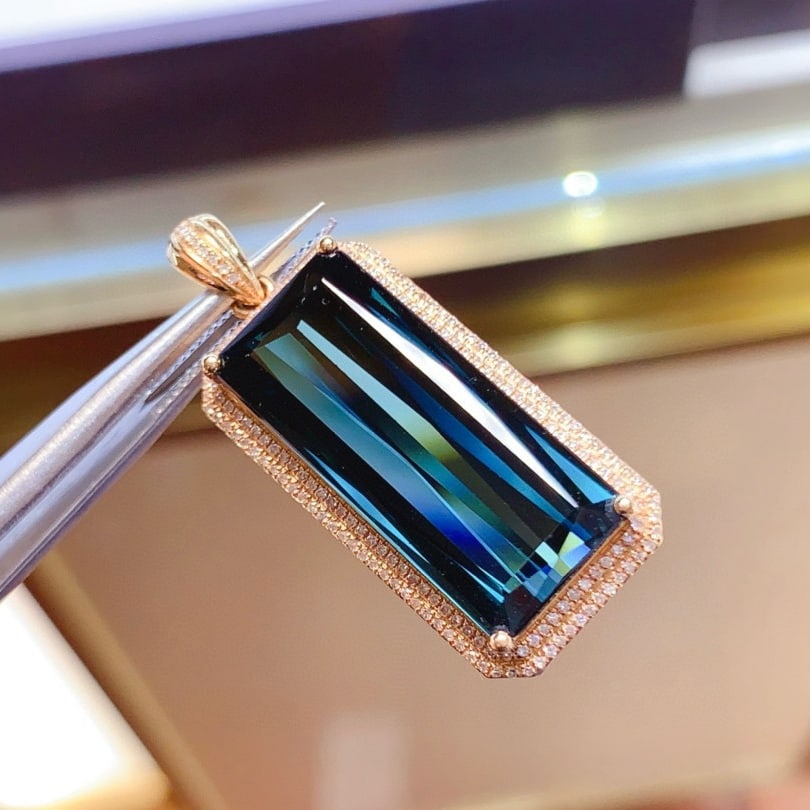 14k Gold 15.76 Ct Natural Tourmaline & Diamond Pendant( Without Chain ): Ref:230946254 // gold content:14k gold // main gemstone:tourmaline // shape:octagonal // carat weight:15. 76ct // color:blue // treatment:natural // // adjacent gemstone 2 : diamond // shape:round