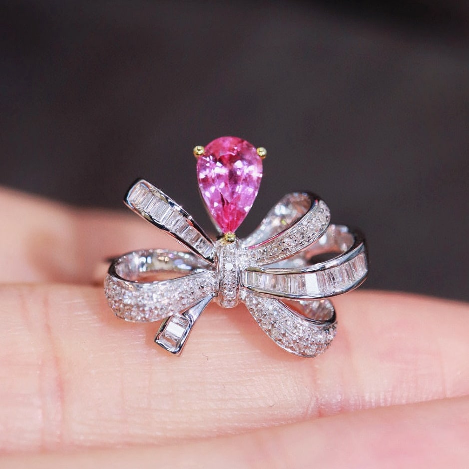 14k Gold 1.14 Ctw Natural Sapphire & Diamond Ring: Ref:230946328 // gold content:14k gold // ring size:7. 25us // // main gemstone:sapphire // shape:pear // carat weight:0. 75ct // color:pink // treatment:natural // // adjacent gemstone 2 : diamond //