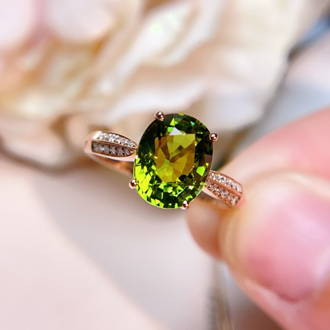 14k Gold 2.6 Ct Natural Tourmaline & Diamond Ring: Ref:230946337 // gold content:14k gold // ring size:7. 25us // // main gemstone:tourmaline // shape:oval // carat weight:2. 6ct // color:green // treatment:natural // // adjacent gemstone 2 : diamond