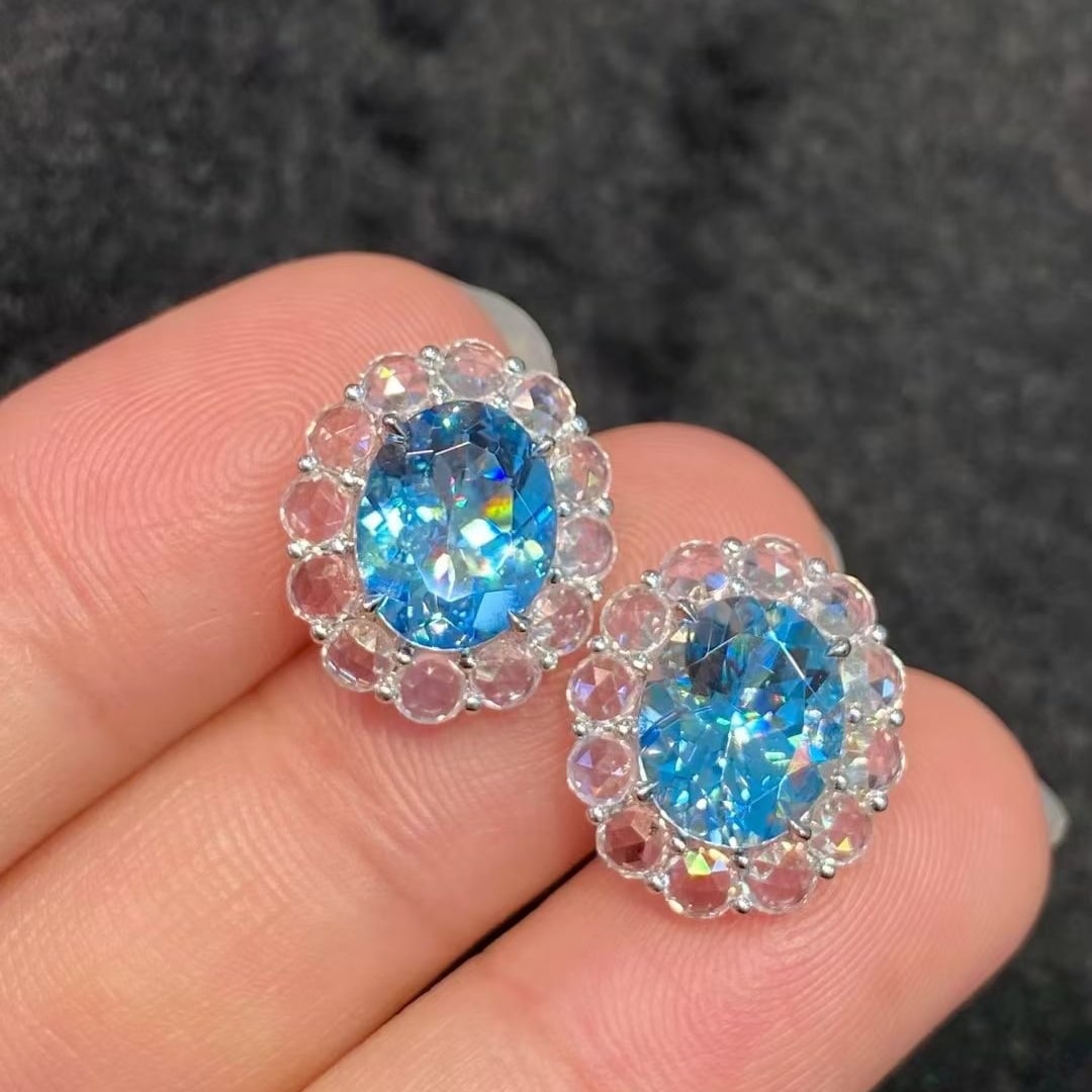 14k Gold 7.02 Ctw Natural Aquamarine & Sapphire Earrings: Ref:230946386 // gold content:14k gold // main gemstone:aquamarine // shape:oval // carat weight:4. 15ct // color:santa maria color // treatment:natural // // adjacent gemstone 2 : sapphire // shape:r