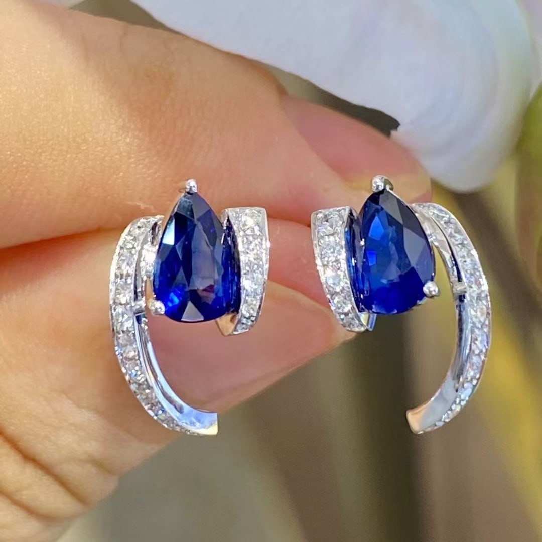 14k Gold 1.93 Ctw Vivid Blue Natural Sapphire & Diamond Earrings: Ref:230946393 // gold content:14k gold // main gemstone:sapphire // shape:pear // carat weight:1. 54ct // color:vivid blue // treatment:natural // // adjacent gemstone 2 : diamond // shape:round // ca
