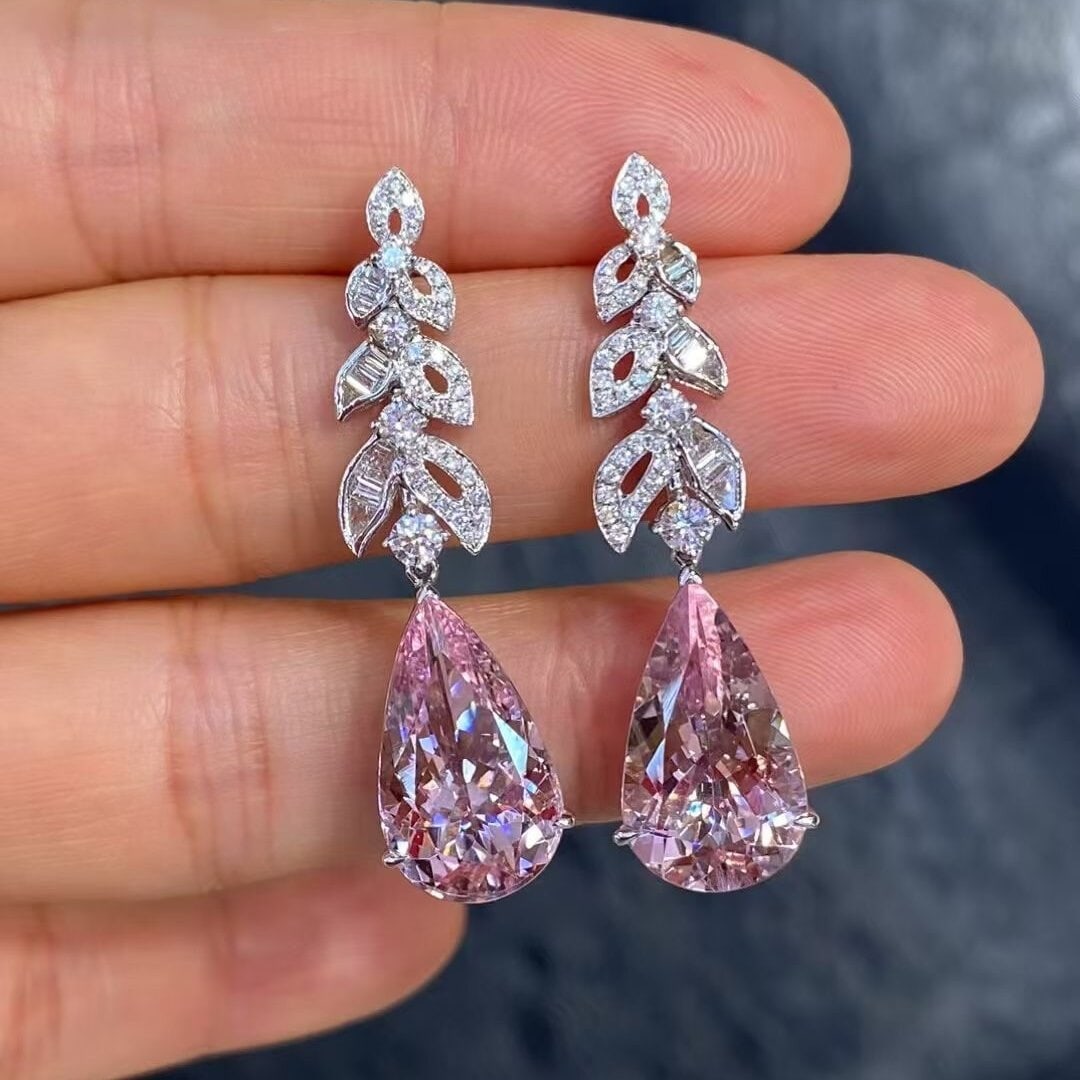 14k Gold 10.23 Ctw Natural Morganite & Diamond Earrings: Ref:230946421 // gold content:14k gold // main gemstone:morganite // shape:pear // carat weight:9. 16ct // color:pink // treatment:natural // // adjacent gemstone 2 : diamond // shape:multiply //