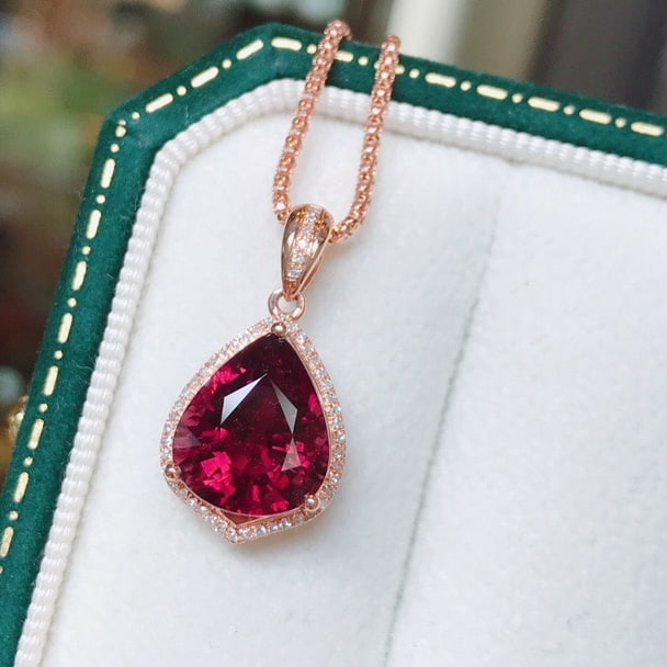 14k Gold 4.14 Ct Natural Tourmaline & Diamond Pendant( Without Chain ): Ref:230946424 // gold content:14k gold // main gemstone:tourmaline // shape:pear // carat weight:4. 14ct // color:red // treatment:natural // // adjacent gemstone 2 : diamond // number of stones:50