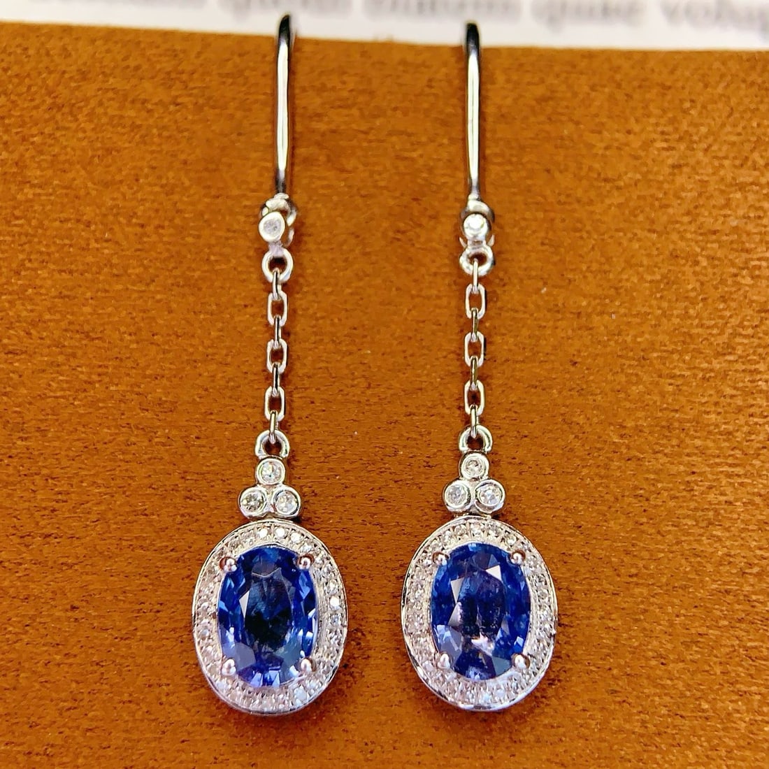 14k Gold 2.18 Ct Natural Sapphire & Diamond Earrings: Ref:231173187 // gold content:14k gold // main gemstone:sapphire // shape:oval // carat weight:2. 18ct // color:blue // treatment:natural // // adjacent gemstone 2 : diamond // number of stones:66 // 
