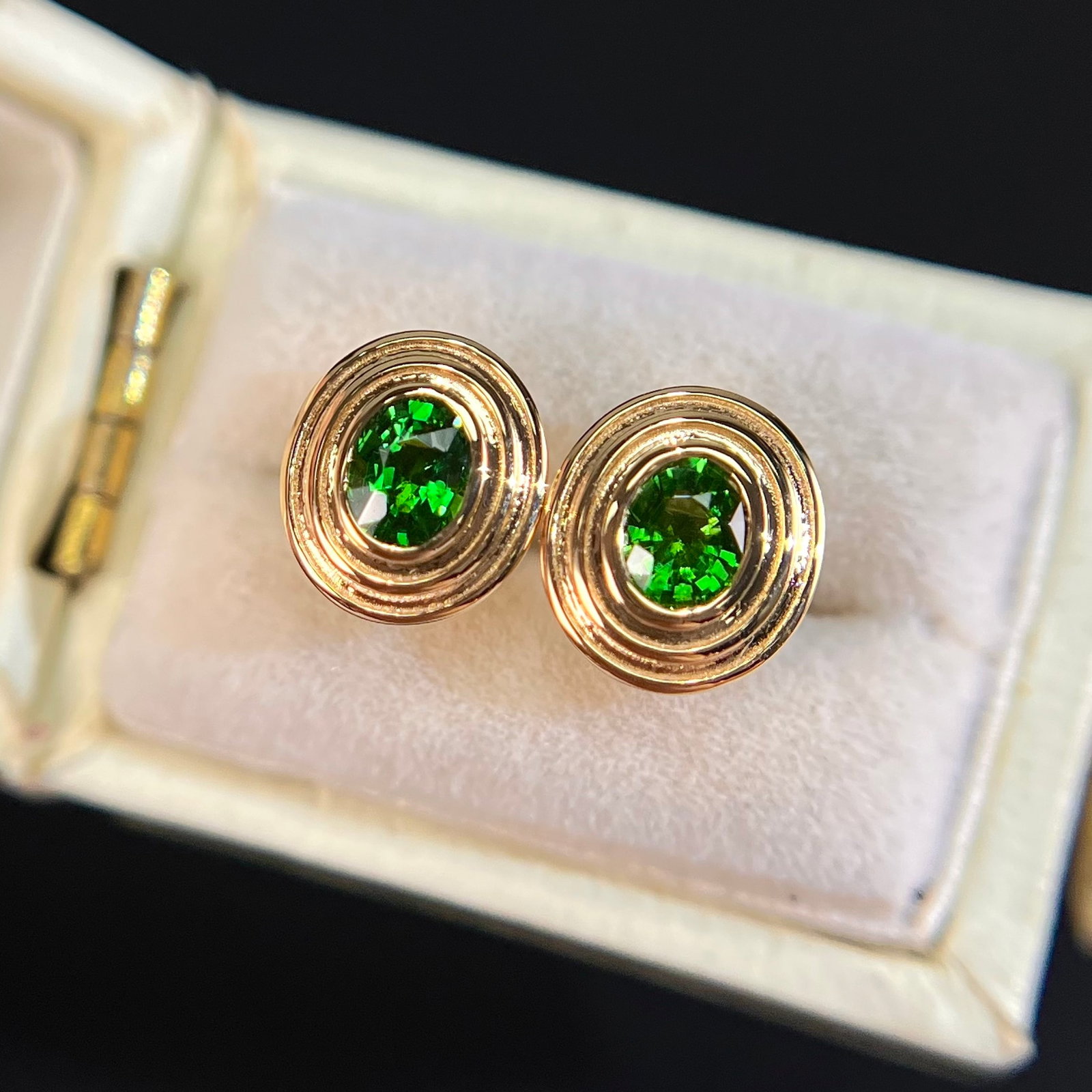 14k Gold 0.58 Ct Natural Tsavorite Earrings: Ref:231174175 // gold content:14k gold // main gemstone:tsavorite // shape:oval // carat weight:0. 58ct // color:green // treatment:natural // Condition: New Low Estimate: 1300.00 High Estimate: