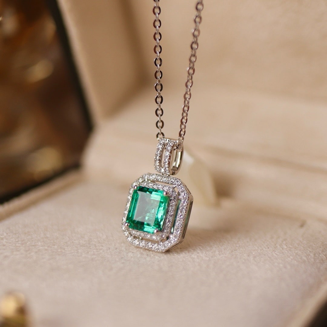 14k Gold 2.11 Ctw Natural Emerald & Diamond Necklace: Ref:231174192 // gold content:14k gold // main gemstone:emerald // shape:octagonal // carat weight:1. 66ct // color:green // treatment:natural // // adjacent gemstone 2 : diamond // shape:round // car