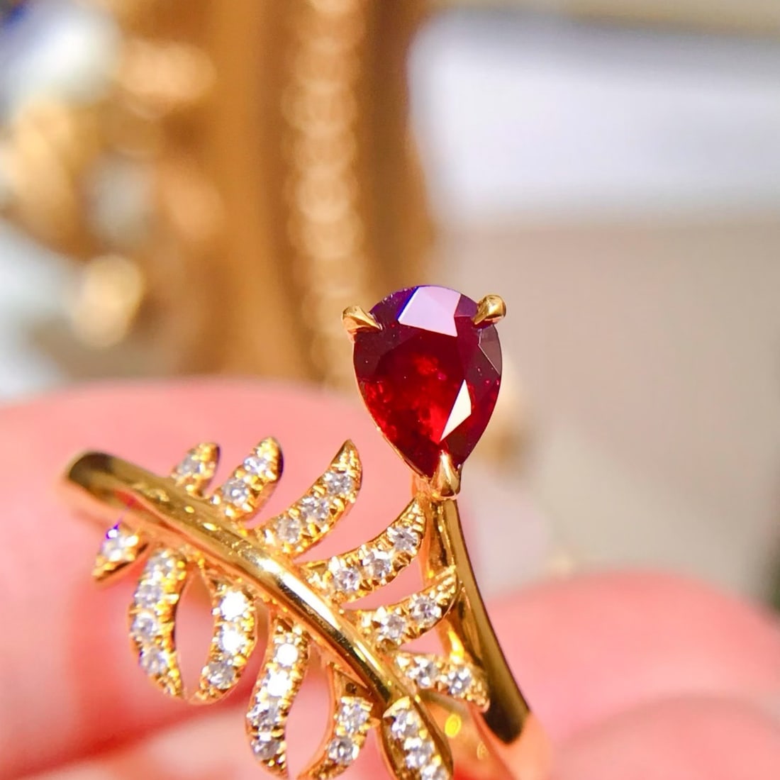 14k Gold 0.62 Ctw Natural Ruby & Diamond Ring: Ref:231174442 // gold content:14k gold // ring size:7. 25us // // main gemstone:ruby // shape:pear // carat weight:0. 5ct // color:red // treatment:natural // // adjacent gemstone 2 : diamond //