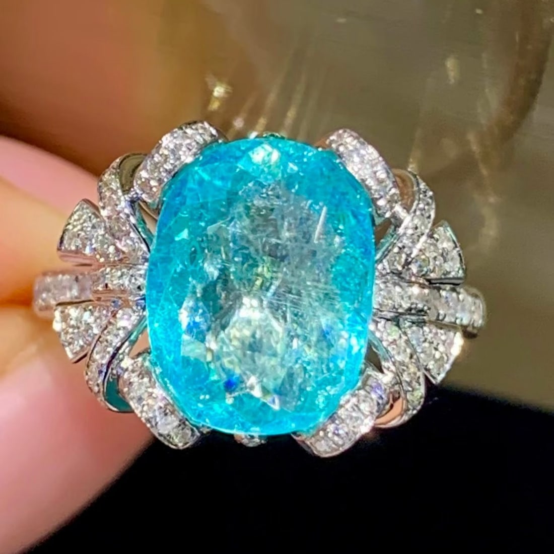 14k Gold 3.9 Ct Natural Paraiba Tourmaline & Diamond Ring: Ref:231175065gold // content:14k // goldring // size:7. 25usmain // gemstone:paraiba // tourmalineshape:ovalcarat // weight:3. 9ct // color:bluetreatment:naturaladjacent // gemstone // 2 // : // diamo