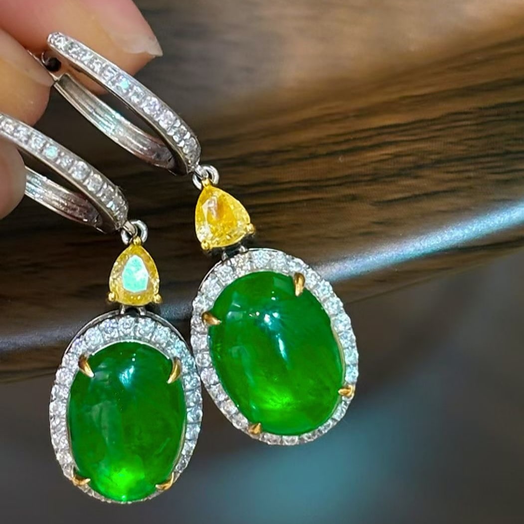 14k Gold 5.8 Ct Natural Emerald & Diamond Earrings: Ref:231175136gold // content:14k // goldmain // gemstone:emeraldshape:ovalcarat // weight:5. 8ct // color:greentreatment:naturaladjacent // gemstone // 2 // : // diamondshape:multipleclarity //