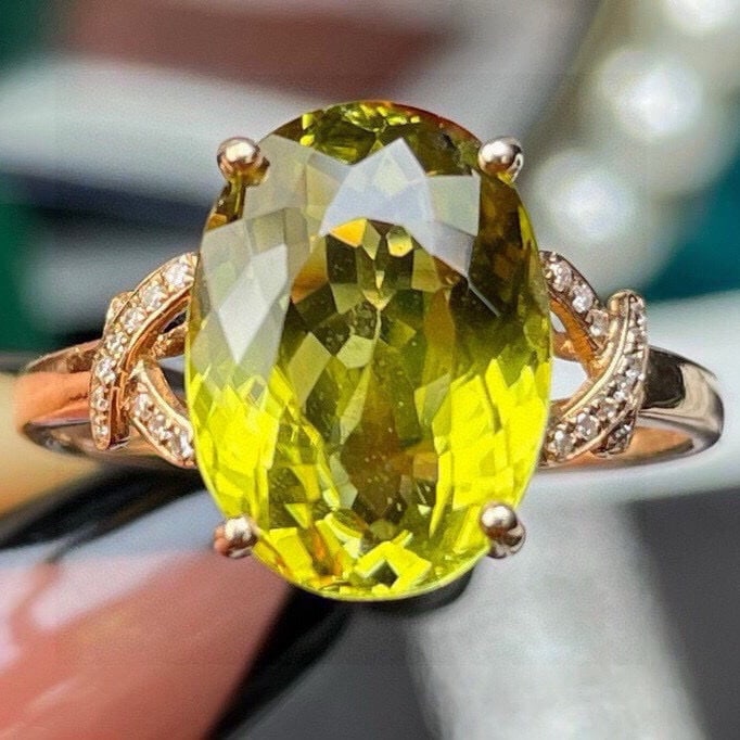 14k Gold 5.65 Ct Natural Tourmaline & Diamond Ring: Ref:231175167gold // content:14k // goldring // size:7. 25usmain // gemstone:tourmalineshape:ovalcarat // weight:5. 65ct // color:yellowish // greentreatment:naturaladjacent // gemstone // 2 // : //