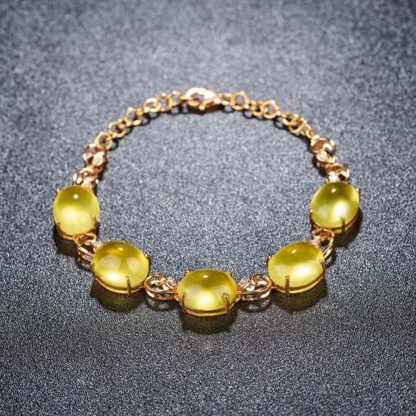 14k Gold 22.5 Ct Natural Prehnite & Diamond Bracelet: Ref:231175168gold // content:14k // goldmain // gemstone:prehnitenumber // of // stones:5shape:ovalcarat // weight:22. 5ct // color:yellowtreatment:naturaladjacent // gemstone // 2 // : //