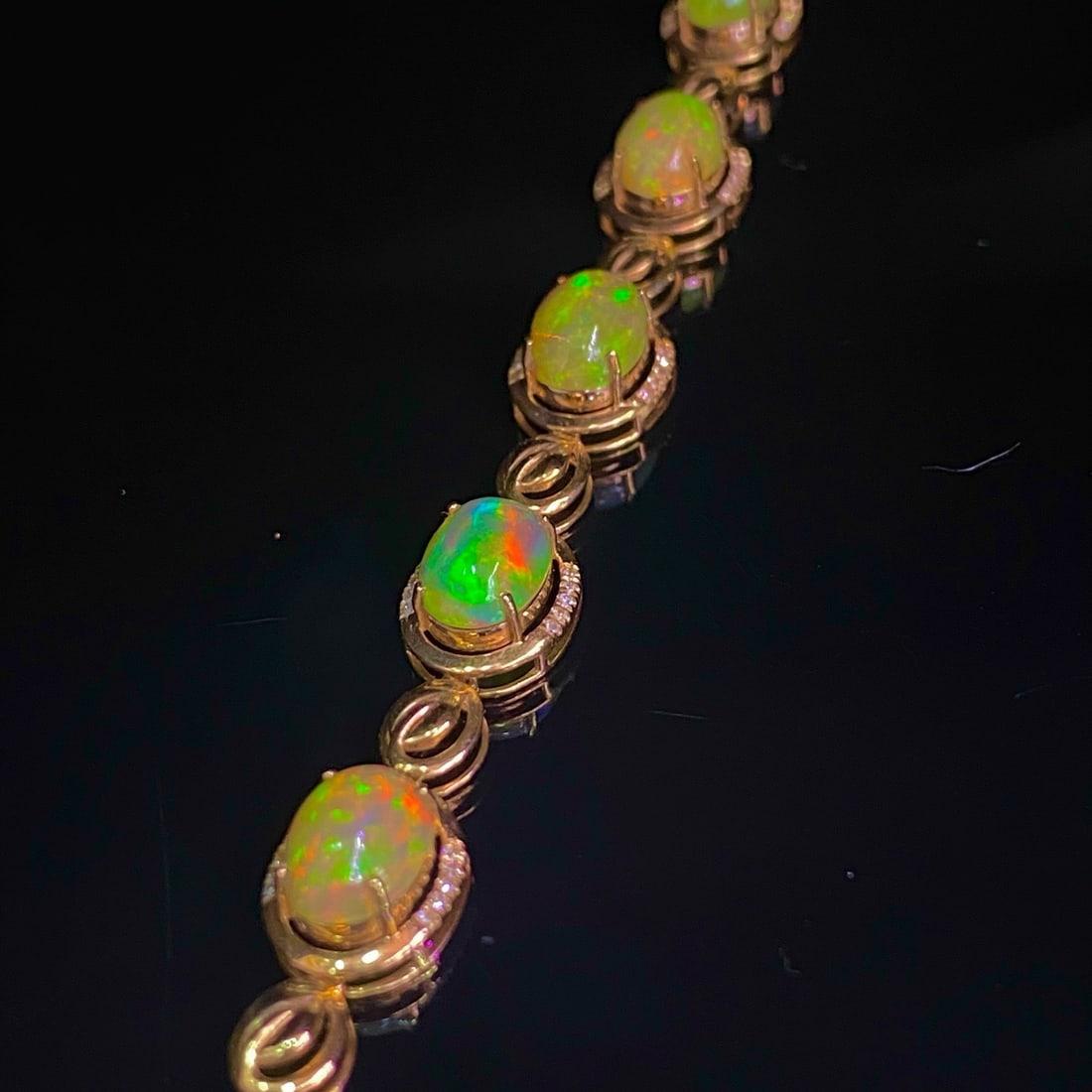 14k Gold 4.05 Ct Natural Opal & Diamond Bracelet: Ref:231175189gold // content:14k // goldmain // gemstone:opalnumber // of // stones:5shape:ovalcarat // weight:4. 05ct // color:colortreatment:naturaladjacent // gemstone // 2 // : // diamondnumber