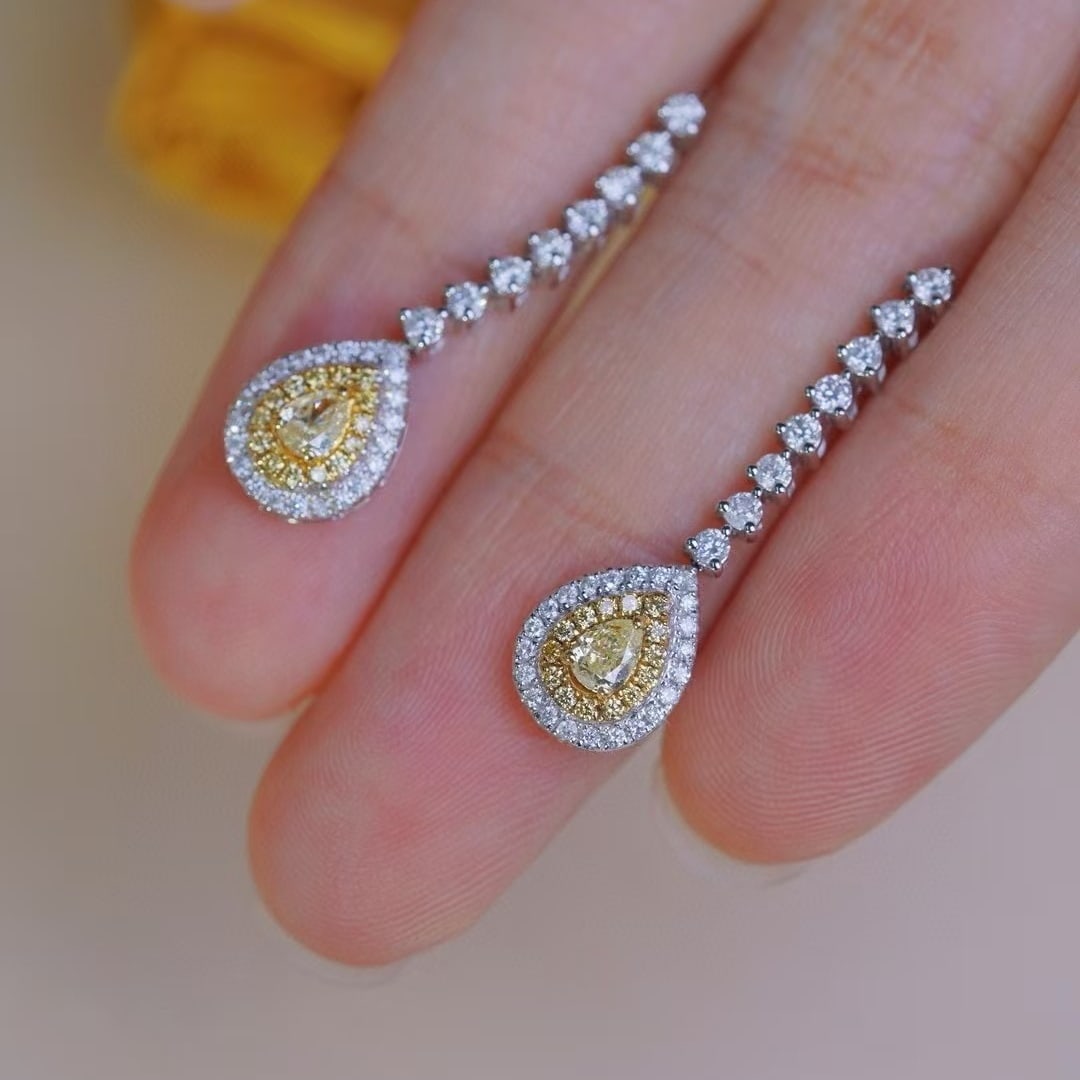 14k Gold 1.00 Ctw Natural Yellow Diamond & Diamond Earrings: Ref:231175243gold // content:14k // goldmain // gemstone:yellow // diamondshape:pearcarat // weight:0. 24ct // color:yellowtreatment:naturaladjacent // gemstone // 2 // : // diamondshape:roundcarat
