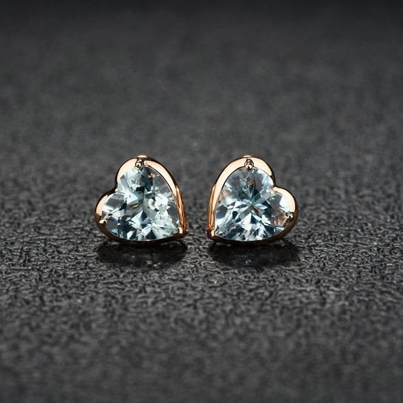 14k Gold 2.28 Ct Natural Aquamarine Earrings: Ref:231176023gold // content:14k // goldmain // gemstone:aquamarineshape:heartcarat // weight:2. 28ct // color:bluetreatment:natural Condition: New Low Estimate: 1800.00 High Estimate: 2600.00