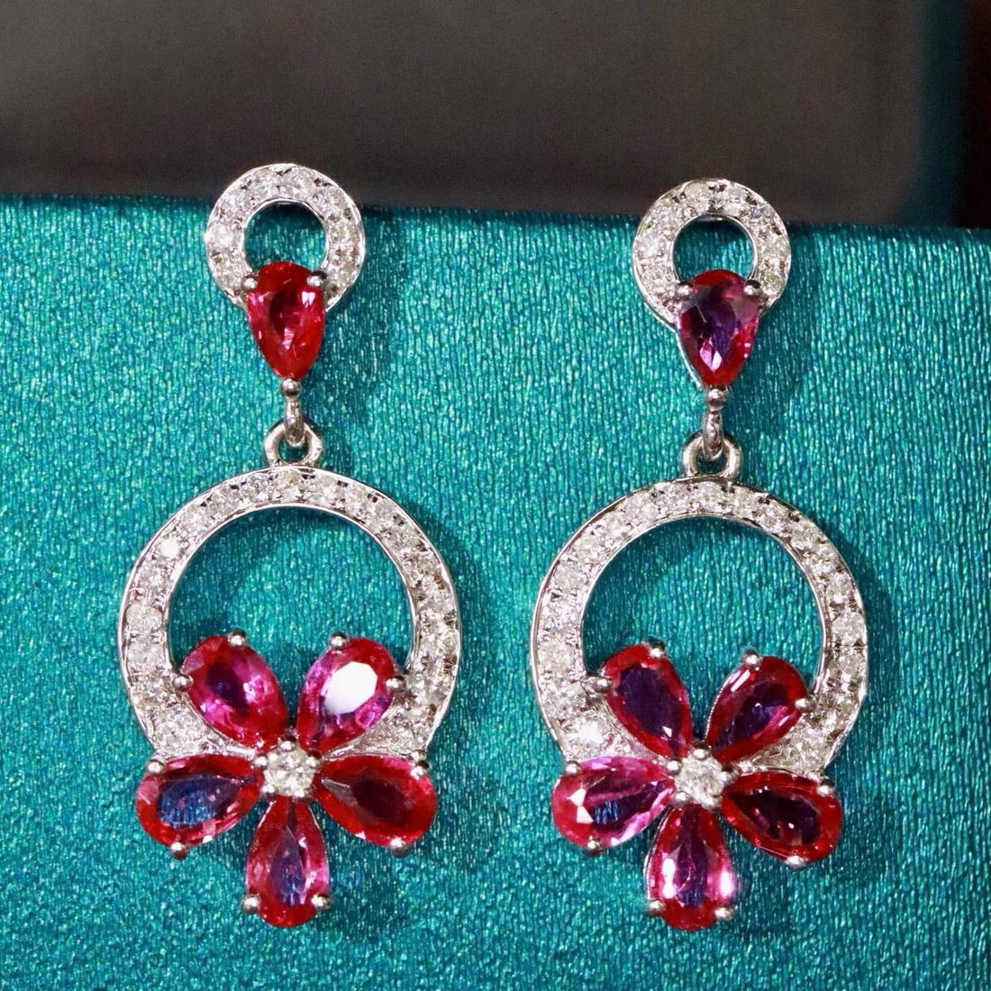 14k Gold 3.25 Ctw Natural Ruby & Diamond Earrings: Ref:231176030gold // content:14k // goldmain // gemstone:rubyshape:pearcarat // weight:2. 82ct // color:redtreatment:naturaladjacent // gemstone // 2 // : // diamondshape:roundcarat // weight:0. 43ct 