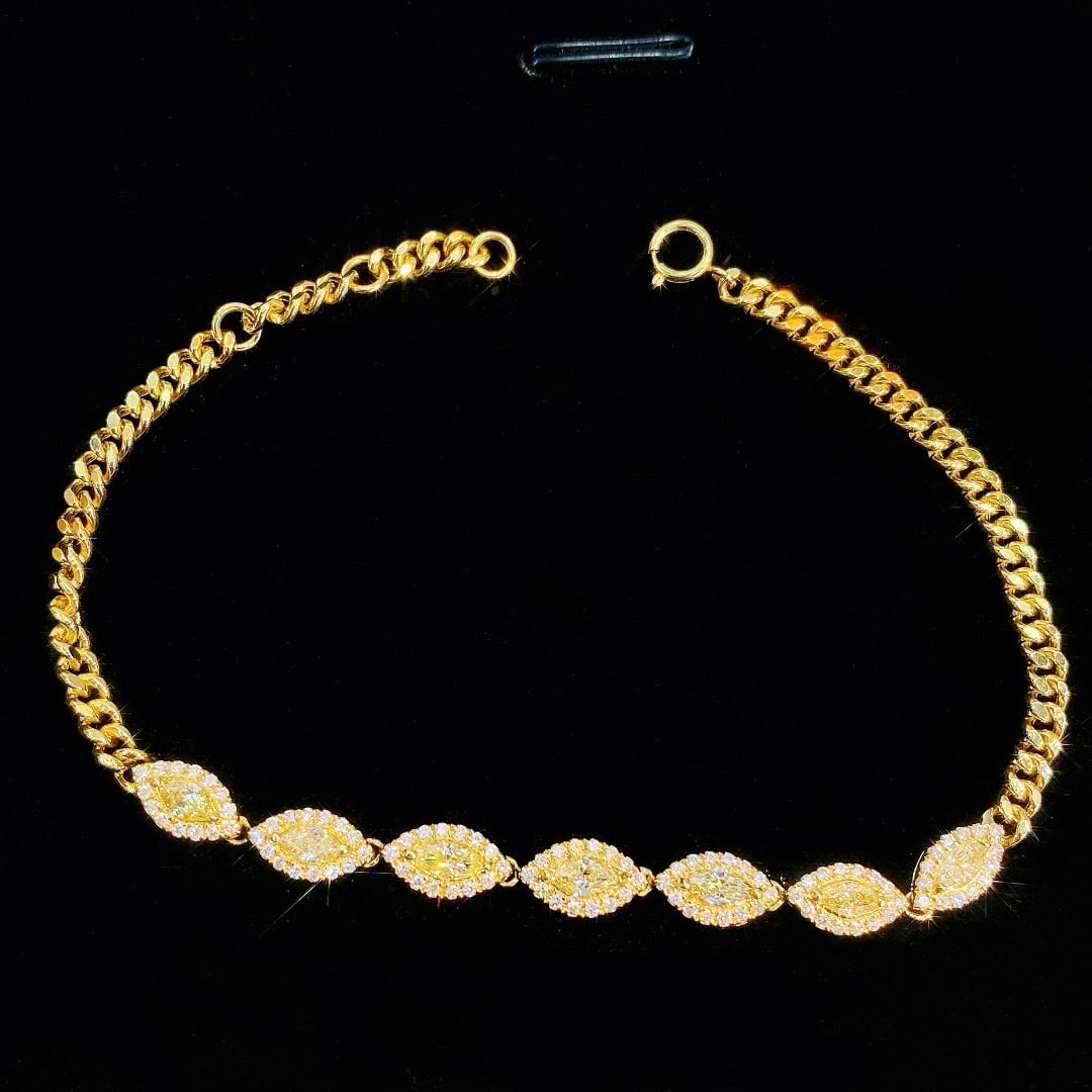 14k Gold 1.27 Ctw Natural Yellow Diamond & Diamond Bracelet: Ref:231176046gold // content:14k // goldmain // gemstone:yellow // diamondshape:marquisecarat // weight:0. 82ct // color:yellowtreatment:naturaladjacent // gemstone // 2 // : // diamondshape:roundcara