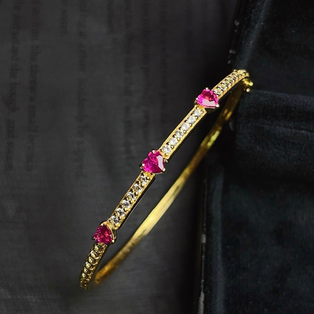 14k Gold 1.20 Ct Natural Ruby & Sapphire Bangle: Ref:231176080gold // content:14k // goldmain // gemstone:rubyshape:heartcarat // weight:1. 20ct // color:redtreatment:naturaladjacent // gemstone // 2 // : // sapphirenumber // of // stones:30shape:ro
