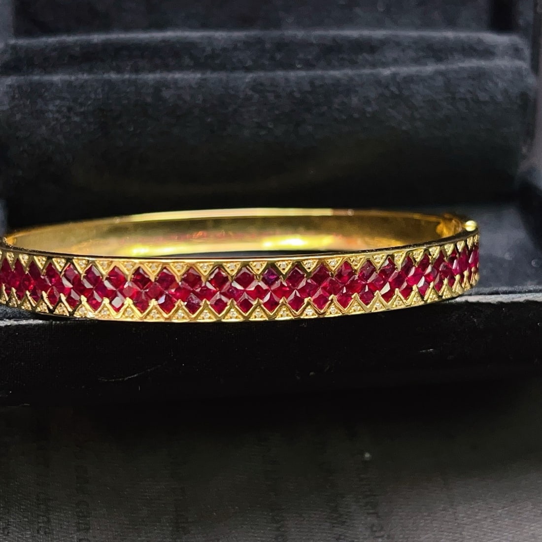14k Gold 5.27 Ct Natural Ruby & Diamond Bangle: Ref:231176100gold // content:14k // goldmain // gemstone:rubyshape:princesscarat // weight:5. 27ct // color:redtreatment:naturaladjacent // gemstone // 2 // : // diamondnumber // of // stones:54shape: