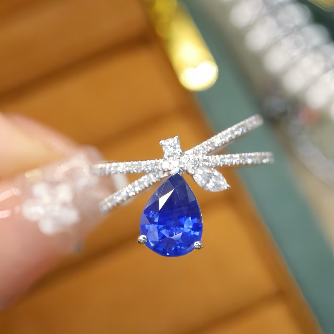 14k Gold 1.59 Ctw Vivid Blue Natural Sapphire & Diamond Ring: Ref:231176114gold // content:14k // goldring // size:7. 25usmain // gemstone:sapphireshape:pearcarat // weight:1. 32ct // color:vivid // bluetreatment:naturaladjacent // gemstone // 2 // : // diamondn