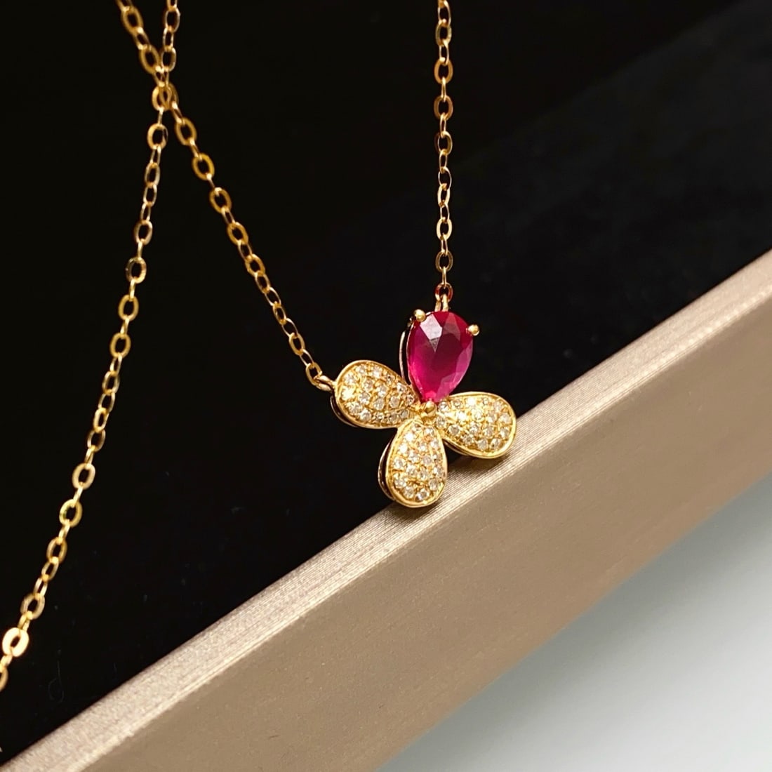 14k Gold 0.80 Ct Natural Ruby & Diamond Necklace: Ref:231176116gold // content:14k // goldmain // gemstone:rubyshape:pearcarat // weight:0. 80ct // color:redtreatment:naturaladjacent // gemstone // 2 // : // diamondnumber // of // stones:51shape:roun