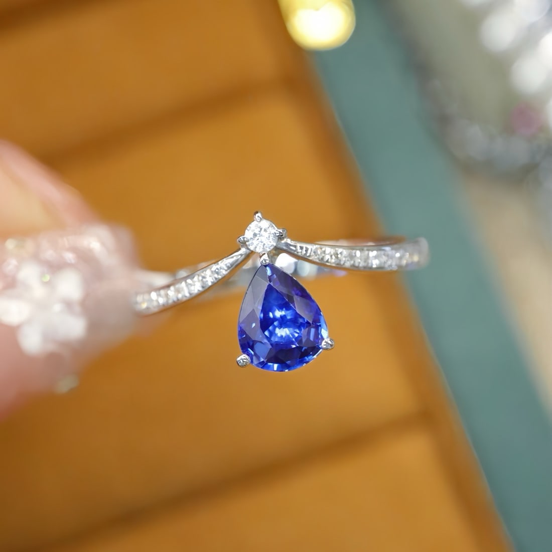 14k Gold 0.72 Ctw Natural Sapphire & Diamond Ring: Ref:231176120gold // content:14k // goldring // size:7. 25usmain // gemstone:sapphireshape:pearcarat // weight:0. 63ct // color:bluetreatment:naturaladjacent // gemstone // 2 // : // diamondnumber //
