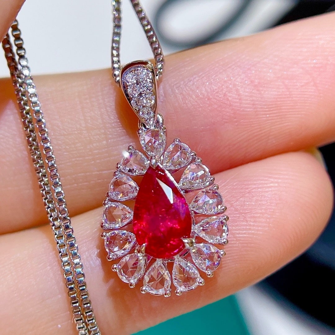 14k Gold 1.67 Ctw Vivid Red Natural Ruby & Diamond Pendant( Without Chain ): Ref:231176131gold // content:14k // goldmain // gemstone:rubyshape:pearcarat // weight:1. 02ct // color:vivid // redtreatment:naturaladjacent // gemstone // 2 // : // diamondshape:multiplecarat // wei