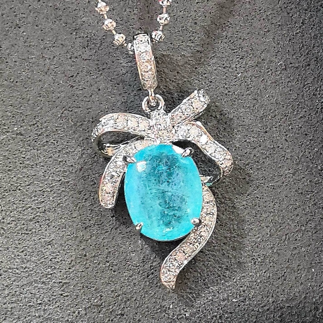 14k Gold 2.76 Ctw Natural Paraiba Tourmaline & Diamond Pendant( Without Chain ): Ref:231176191gold // content:14k // goldmain // gemstone:paraiba // tourmalineshape:ovalcarat // weight:2. 52ct // color:bluetreatment:naturaladjacent // gemstone // 2 // : // diamondshape:roundcarat